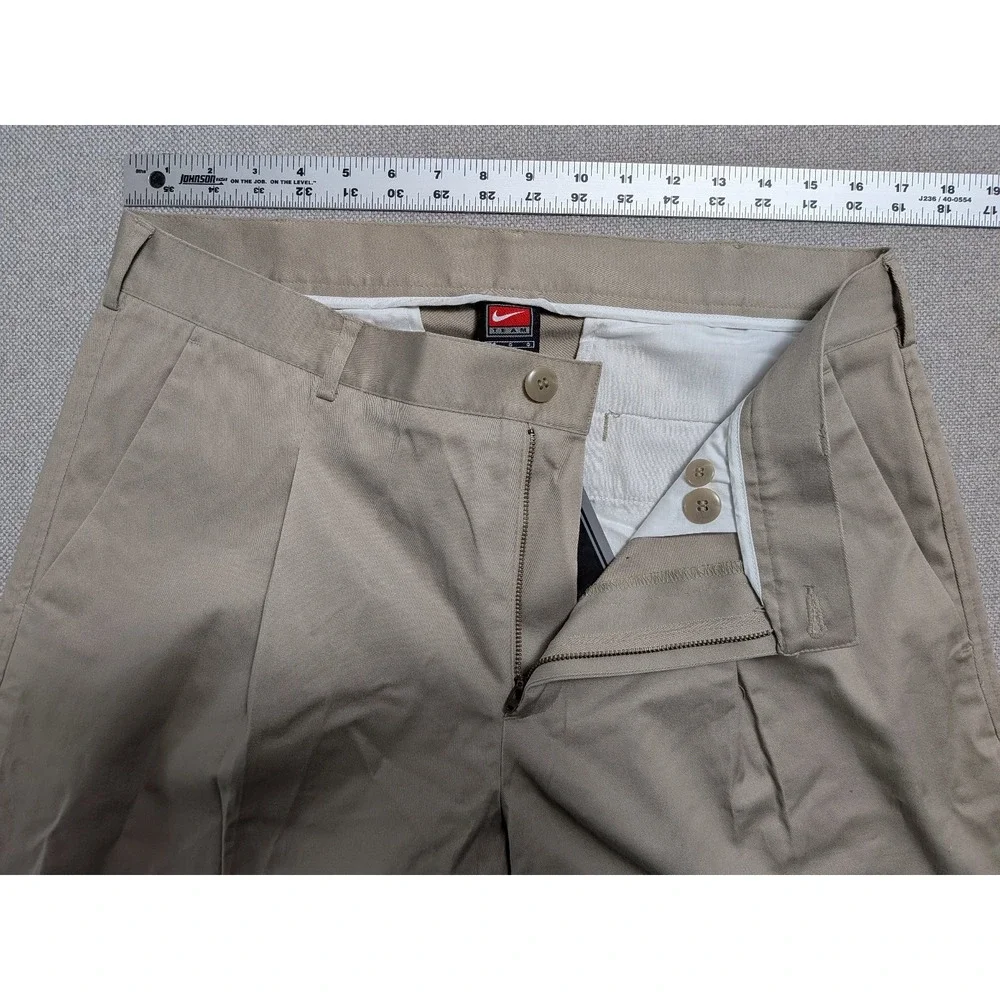Nike Team Men's Will Chino Pants Tan 36 Cotton Spandex Pleated Unhemmed Golf NWT